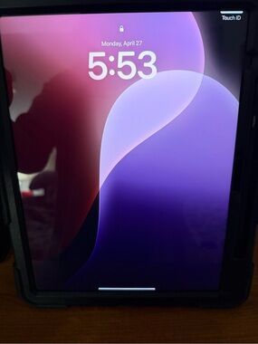 Tablet with Purple Gradient Lock Screen